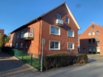 Haus seitlich - Helle 4-Zimmer-Wohnung mit Balkon in Bersenbrück