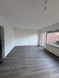 Helles Wohnzimmer mit Balkon - Schnell sein lohnt sich! Frisch sanierte 3-Zimmer-Wohnung in Bramsche.