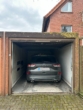 Auto in Garage geparkt - Charmante Eigentumswohnung auf dem Bramscher Berg!