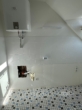 Leeres Badezimmer mit Boiler - Möblierte 1-Zimmer-Wohnung im Herzen von Osnabrück!