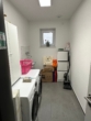 Hauswirtschaftsraum mit Geräten - Zweitbezug! Stylische 3-Zimmer-Wohnung mit Einbauküche in Neuenkirchen-Vörden.