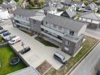 Luftaufnahme Wohngebäude - Geräumige 4-Zimmer-Wohnung mit Balkon in Dissen T. W.
