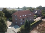 Luftaufnahme eines Hauses - Helle 2-Zimmer-Wohnung mit Abstellraum in ruhiger Lage von Quakenbrück