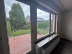 Wohnzimmer mit Gartenblick