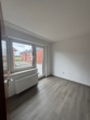 Helles Schlafzimmer mit Balkon