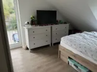 Schlafzimmer mit Balkonblick