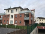Moderne Wohnanlage Außenansicht - Tiefgaragenstellplatz in zentraler Lage in Wallenhorst zu vermieten