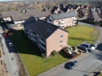 Wohnsiedlung aus der Luft - Moderne 2-Zimmer-Erdgeschosswohnung in zentraler Lage in Fürstenau