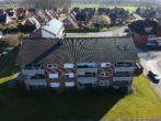 Luftaufnahme Wohngebäude - Moderne 2-Zimmer-Erdgeschosswohnung in zentraler Lage in Fürstenau