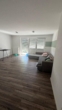 Helles Wohnzimmer mit Terrasse - Helle 2-Zimmer-Wohnung mit Terrasse und Garten in Ankum