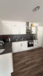 Moderne Einbauküche - Helle 2-Zimmer-Wohnung mit Terrasse und Garten in Ankum