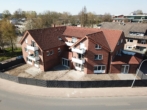 Mehrfamilienhaus Luftaufnahme - Helle 2-Zimmer-Wohnung mit Balkon in Ankum