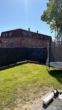 Gartenblick auf Wohngebäude - Helle 2-Zimmer-Wohnung mit Terrasse und Garten in Ankum