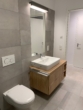 Toilette und Waschbecken - Moderne 3-Zimmer-Wohnung in Osnabrück