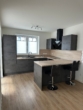 Moderne Küche mit Theke - Jetzt schnell sein! Hochwertige 3-Zimmer-Wohnung mit Garten in Bersenbrück