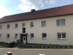 Hausansicht - Helle 3-Zimmer-Erdgeschosswohnung mit Balkon in Hilter T. W.