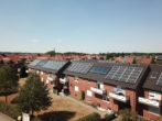 Wohngebäude mit Solarpanels - Helle 3-Zimmer-Wohnung mit Balkon in zentraler Lage in Bramsche