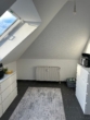 Helle Küche mit Dachfenster - Charmante 2-Zimmer-Wohnung in Bramsche – Moltkestraße
