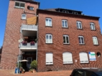 Hausansicht hinten 2 - Charmante 2-Zimmer-Wohnung in Bramsche – Moltkestraße