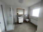 Modernes Badezimmer - Kernsanierte 2-Zimmer-Obergeschosswohnung mit Balkon, mitten in Fürstenau!