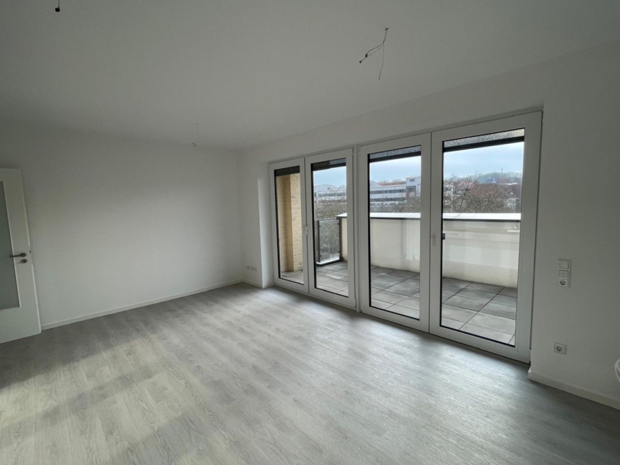 Wohnzimmer mit Balkon