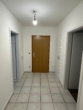 Flur mit drei Türen - Geräumige 3-Zimmer Wohnung im Ortskern von Neuenkirchen/Br. zu vermieten!