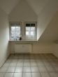 Helles Zimmer mit Dachfenster - Geräumige 3-Zimmer Wohnung im Ortskern von Neuenkirchen/Br. zu vermieten!