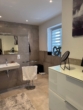 Modernes Badezimmer - Moderne 3-Zimmer-Wohnung mit Balkon in Alfhausen