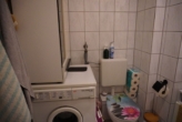 Badezimmer mit Waschmaschine